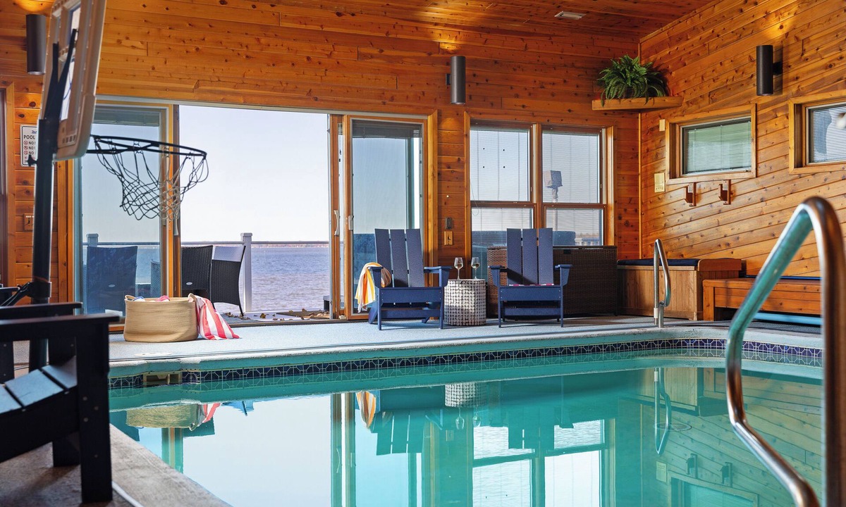 Prudenville House | 6BR Houghton Lake House w/Indoor Pool, Hot Tub, and Golf Simulator - Sleeps 24