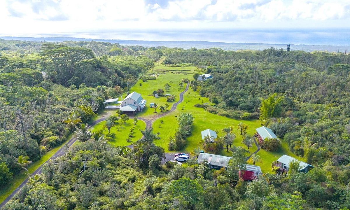Pahoa House | Ocean View Estate with private hiking trail and volcanically heated hot tubs.