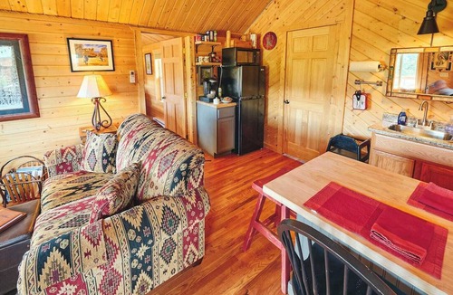 Saddlestring Cabin | Authentic Western-themed log cabin retreat near Bighorn National Forest, Lake DeSmet, & charming towns Buffalo & Sheridan. Perfect for history enthusiasts, hunters, or tranquil escapes. Accommodates up to 4 guests w/2 bedrooms, bath & kitchenette.