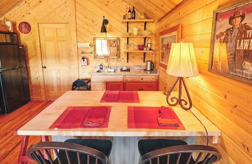 Saddlestring Cabin | Authentic Western-themed log cabin retreat near Bighorn National Forest, Lake DeSmet, & charming towns Buffalo & Sheridan. Perfect for history enthusiasts, hunters, or tranquil escapes. Accommodates up to 4 guests w/2 bedrooms, bath & kitchenette.