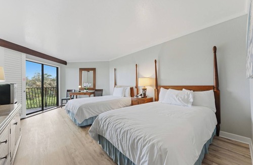 Hanamaulu Condo | Oceanfront Kauai Beach Resort 75 foot waterslide, 4 pools, Jacuzzis, restaurants