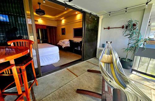 Hilo House | Polynesian Koi Pond Gardens Condo in Hilo w pool