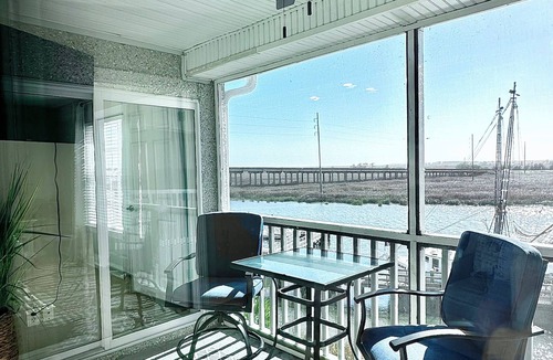 Darien Condo | Wake Up on the River! Walk to charming Downtown Darien. w/boat slip