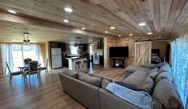 Fly in on a grass runway to a charming 3-bedroom house on a pheasant preserve in Wilmington
