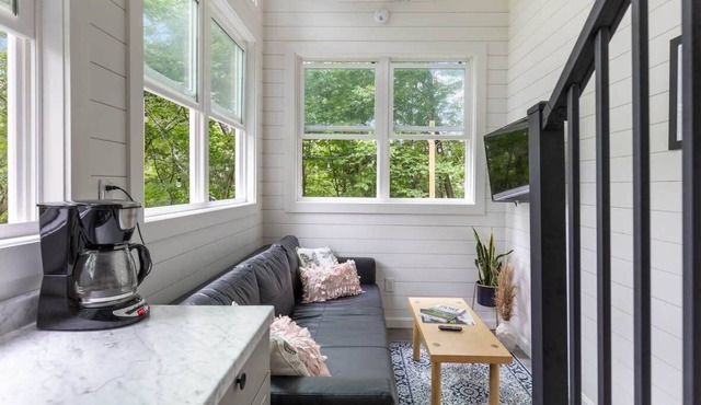 Riverside Luxury Tiny House w/Treehouse Sauna, Hot Tub & Views Near Stowe in Johnson
