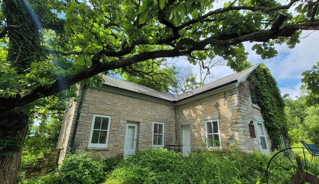 Secluded 1860 Stone House recently remodeled on the Upper Iowa River by Bluffton in Decorah