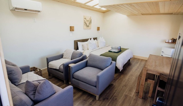 Solar Powered Casita with 2 beds and a comfy seating area overlooking a peaceful desert setting in Monticello