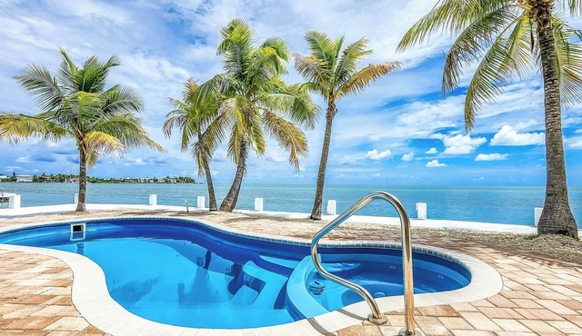 Swept Away – 3BR/2BA Keys Retreat with Pool, Dock & Stunning Open Water Views in Marathon