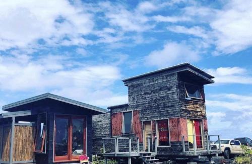 Pahoa House | THE PHOENIX HOUSE - EPIC Tiny Home Gem on Volcanic Lava Field!