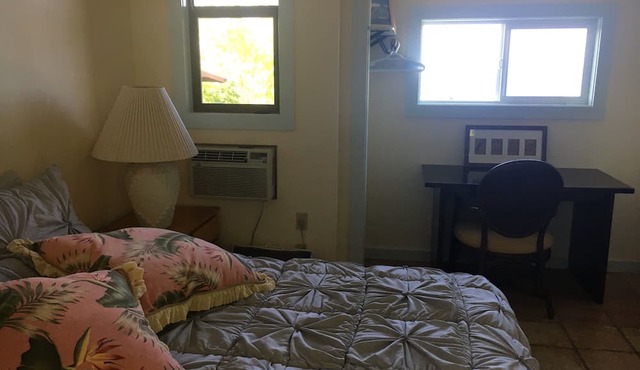 Bungalow 1 with large kitchen, outdoor private shower and 1/2 bath.