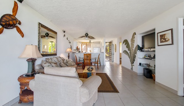 Relax and enjoy your own spacious private lanai with ocean & sunset views
