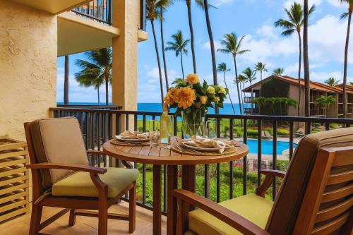 Papakea Oceanfront Studio Sleeps 4 Villas Great for Families Complimentary Car with 6 Nights PKE-304 by KBM